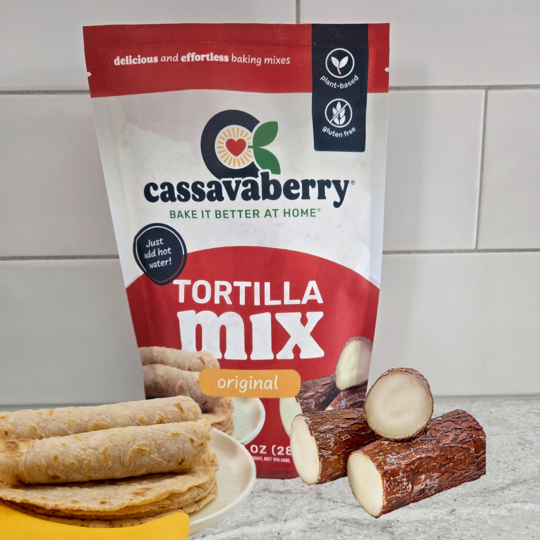 Gluten free, grain free and plant based Original Tortilla Mix package with a plate of tortillas off to the left and 3 cassava roots on the right.