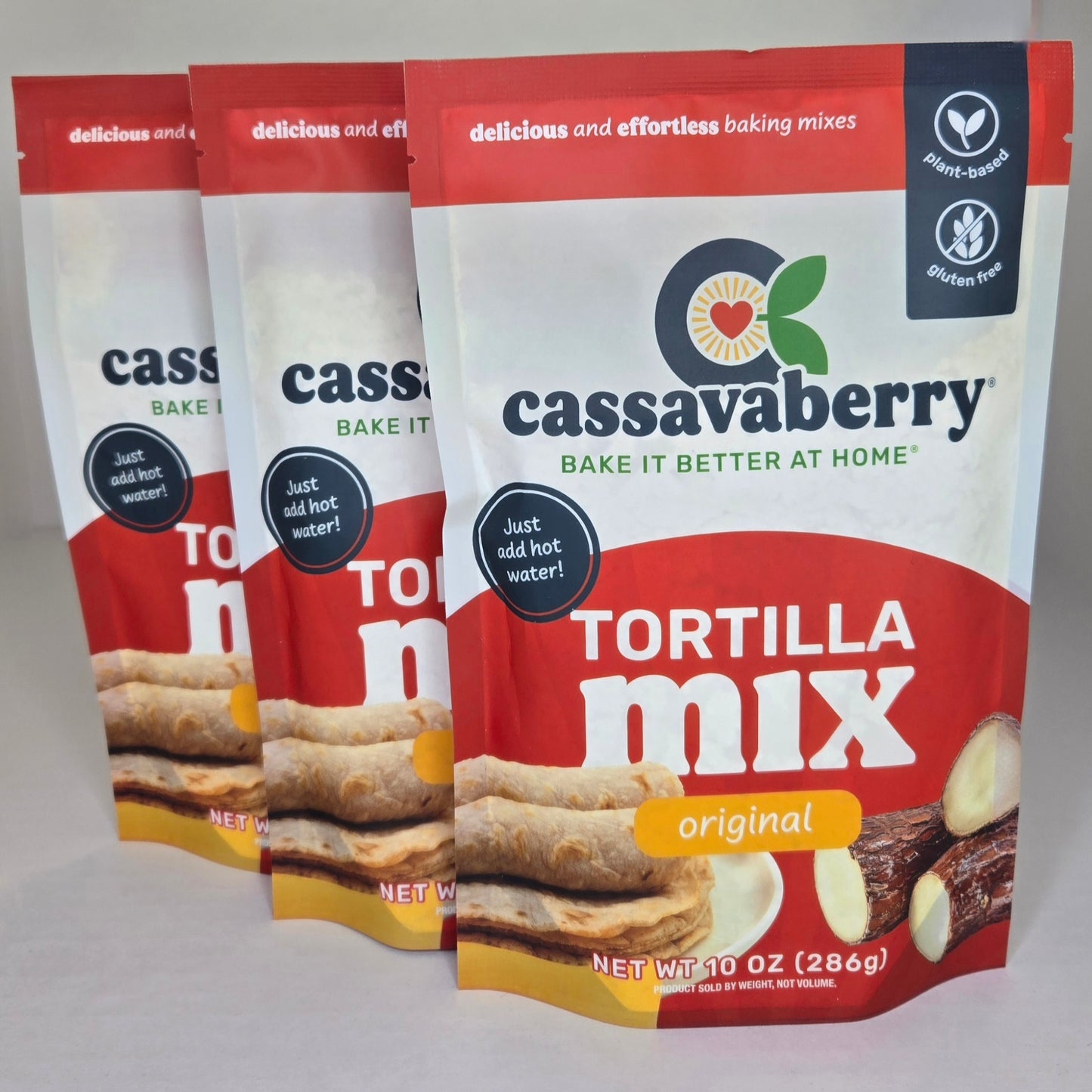 Three packages of Cassavaberry Tortilla Mix on a white background