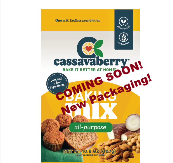 Cassavaberry all-purpose baking mix packaging With a yellow and white design, featuring banana muffins, banana bread, and cassava root, almonds & chickpeas on the front, with a large red 'COMING SOON! New Packaging!' overlay.
