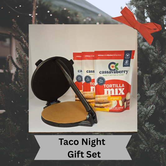 Taco Night Gift Set with tortilla press and 3 Cassavaberry tortilla mix packages against a Christmas tree background.